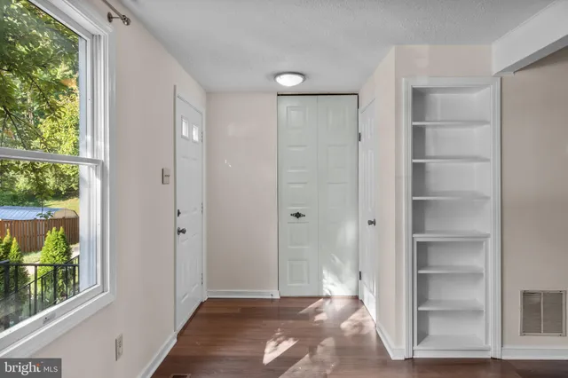 a view of an empty room and window