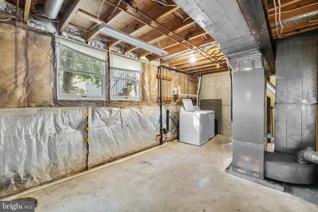 a view of a room with wooden walls