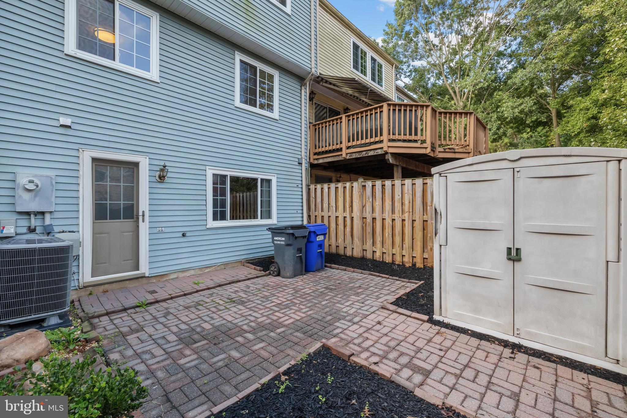 6832 Heatherway Court Alexandria, VA 22315 - Photo 35 of 37 a view of a house with a yard