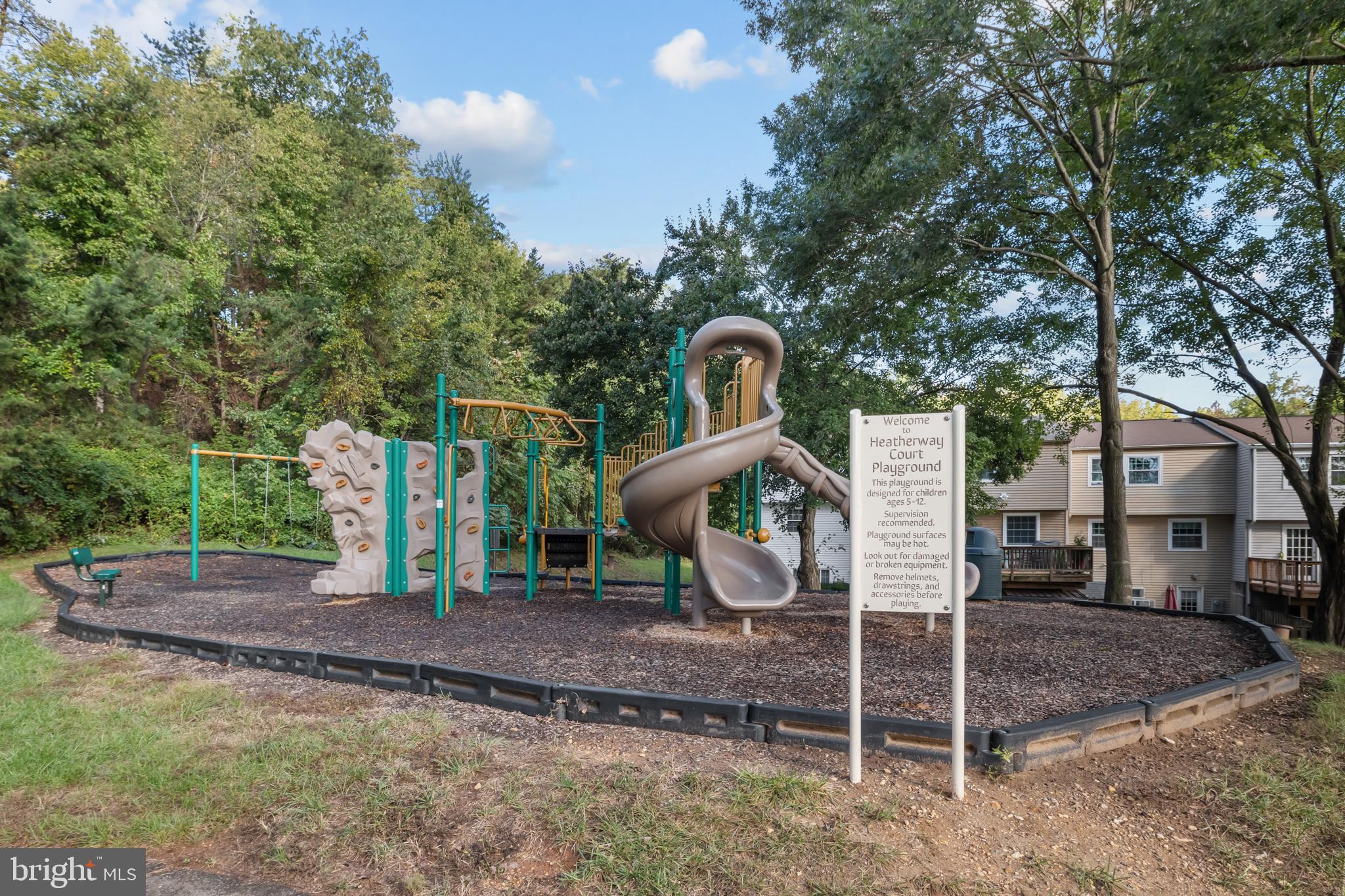 6832 Heatherway Court Alexandria, VA 22315 - Photo 36 of 37 a front view of a house with garden