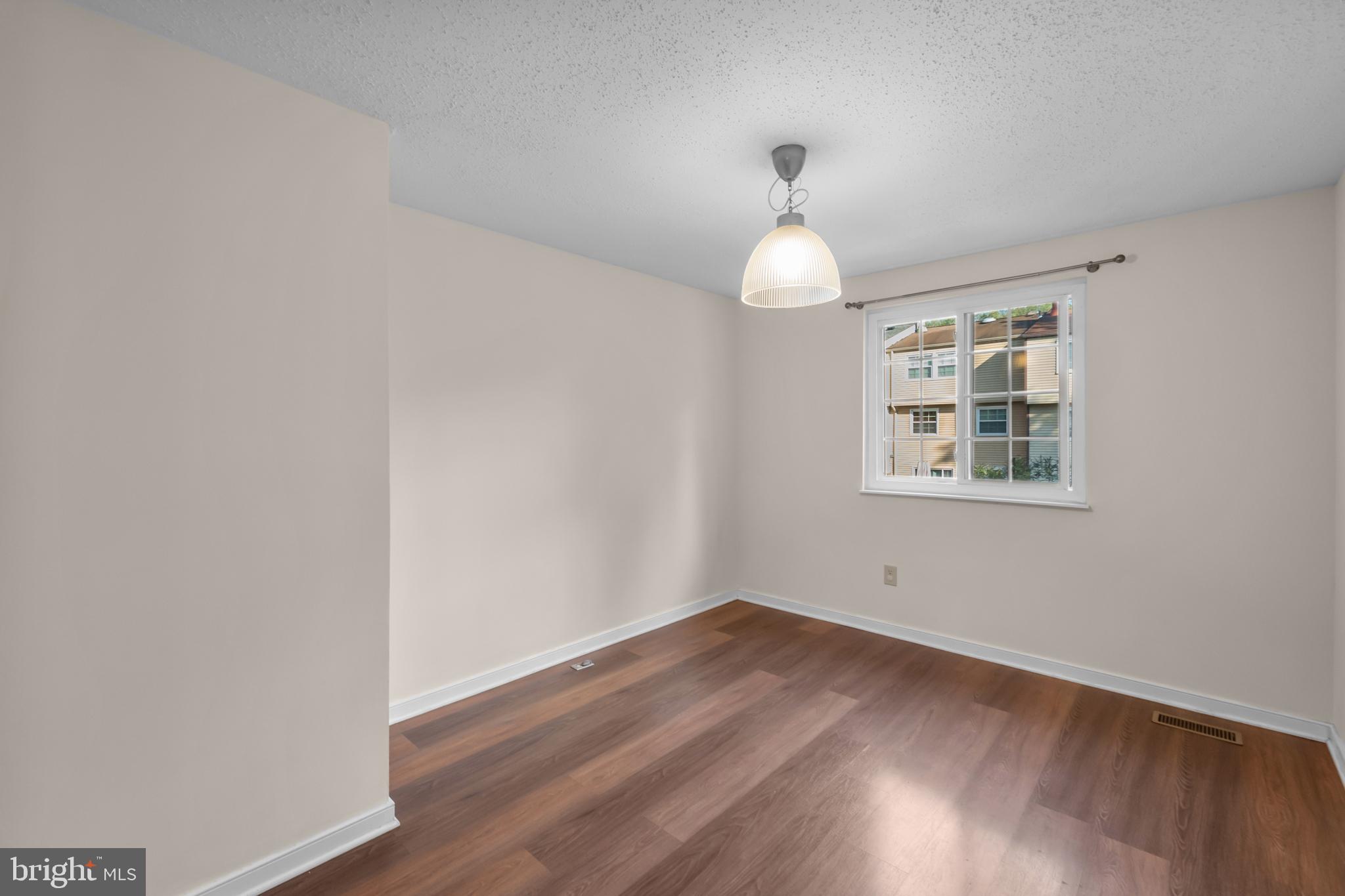 6832 Heatherway Court Alexandria, VA 22315 - Photo 7 of 37 a window in an empty room