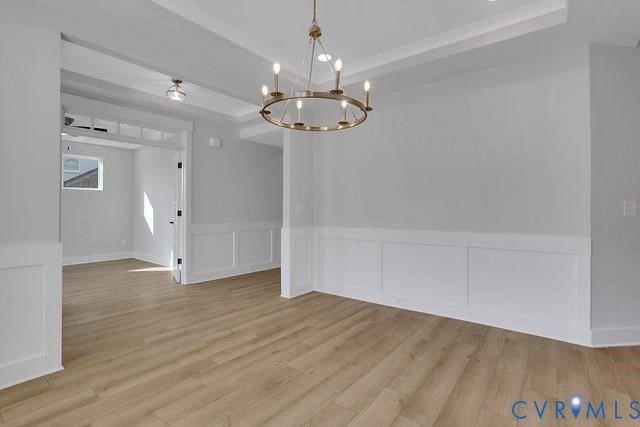3951 Jett Court Gum Spring, VA 23065 - Photo 4 of 12 wooden floor in an empty room with a window