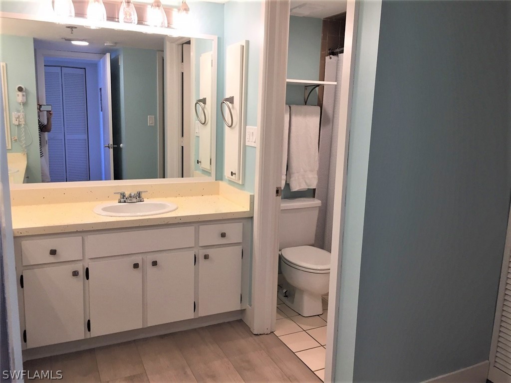 3170 Matecumbe Key Road, Unit 134 Punta Gorda, FL 33955 - Photo 24 of 41 a bathroom with a sink a toilet and shower