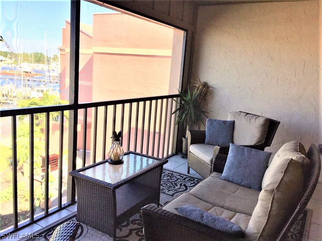 3170 Matecumbe Key Road, Unit 134 Punta Gorda, FL 33955 - Photo 27 of 41 view of balcony with furniture