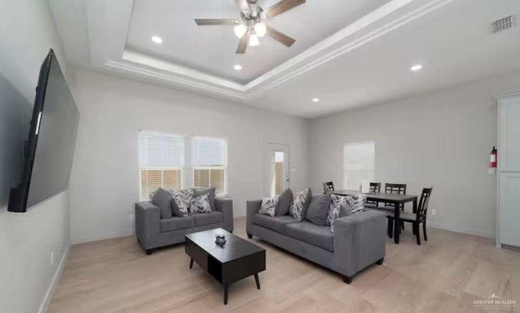 2402 Treasure Cove Harlingen, TX 78550 - Photo 21 of 22 a living room with furniture and a flat screen tv