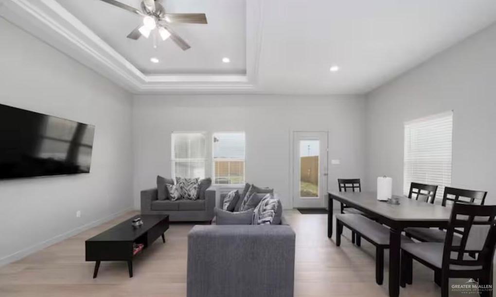 2402 Treasure Cove Harlingen, TX 78550 - Photo 22 of 22 a living room with furniture and a flat screen tv