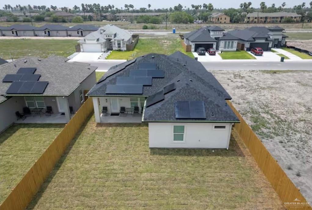 2402 Treasure Cove Harlingen, TX 78550 - Photo 3 of 22 an aerial view of a house with a swimming pool