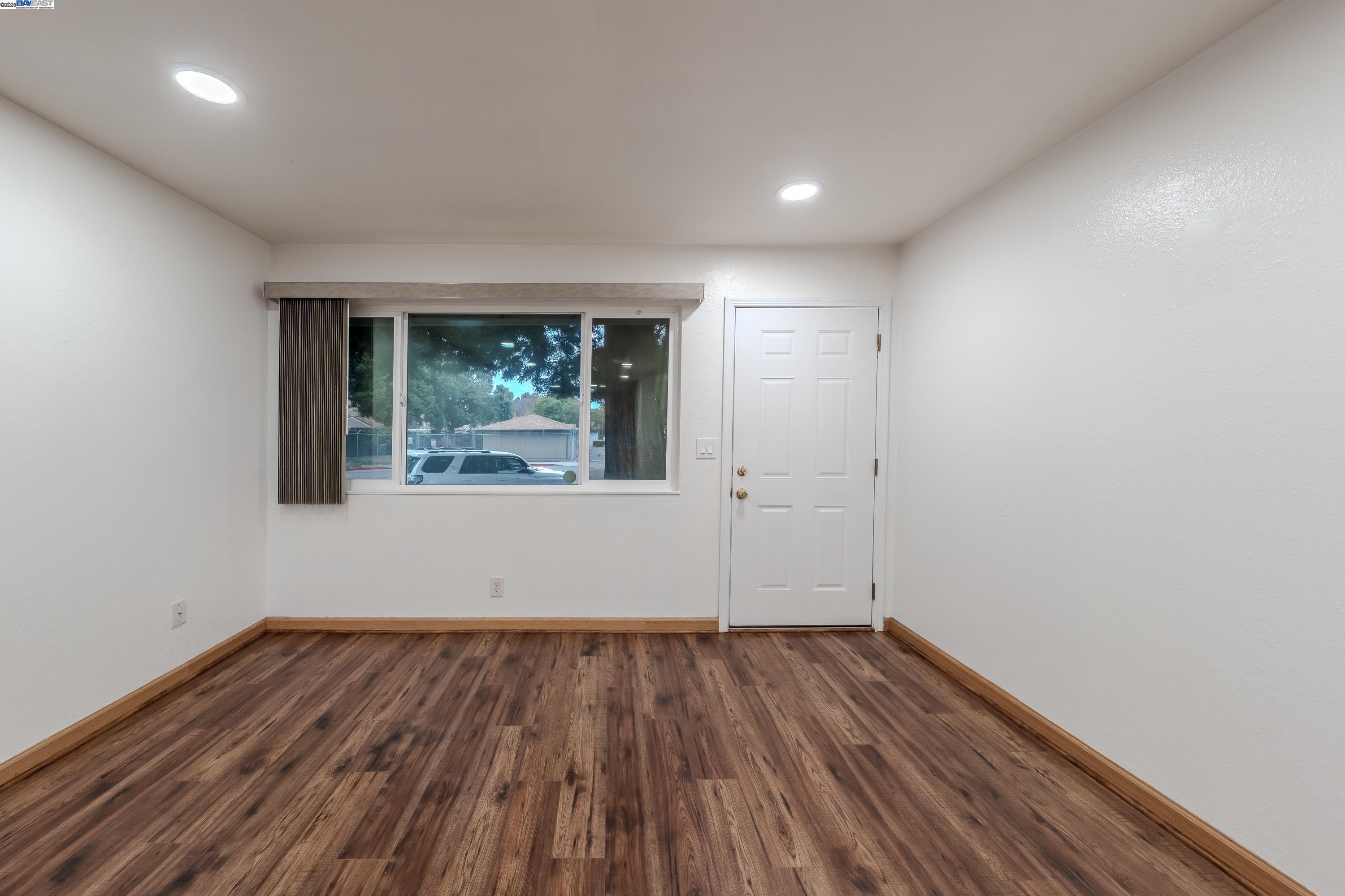 3799 Colet Terrace Fremont, CA 94536 - Photo 10 of 19 wooden floor in an empty room with a window
