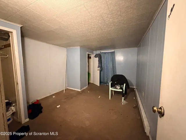 a view of a hallway with workspace