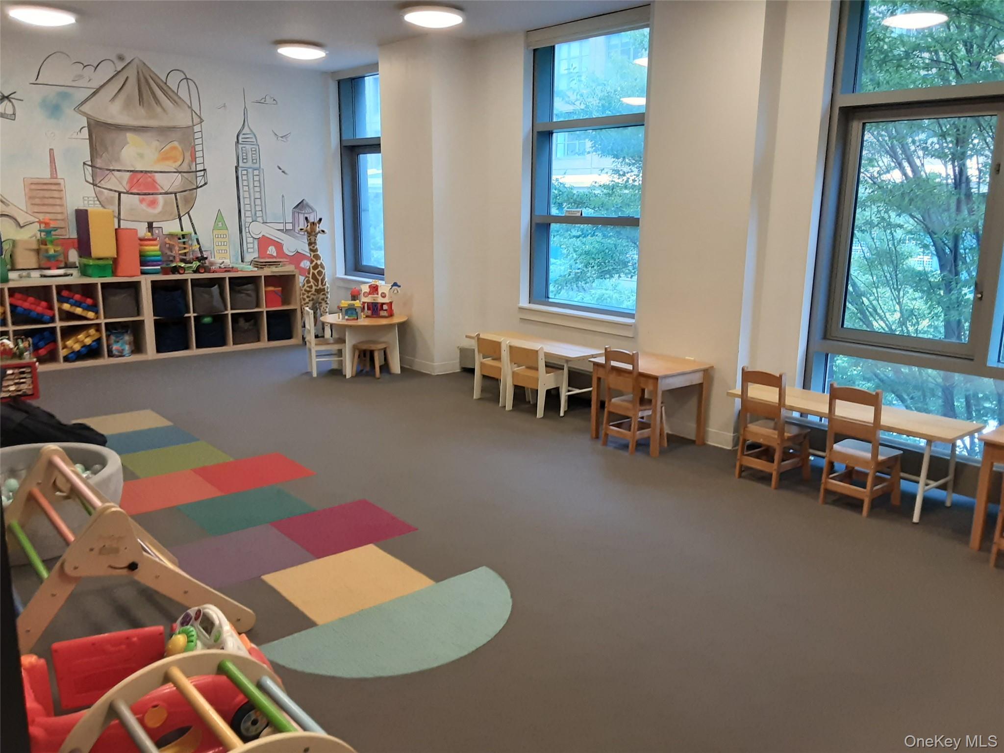 100 Jay Street, Unit 28B Brooklyn, NY 11201 - Photo 15 of 47 a living room with furniture and a window