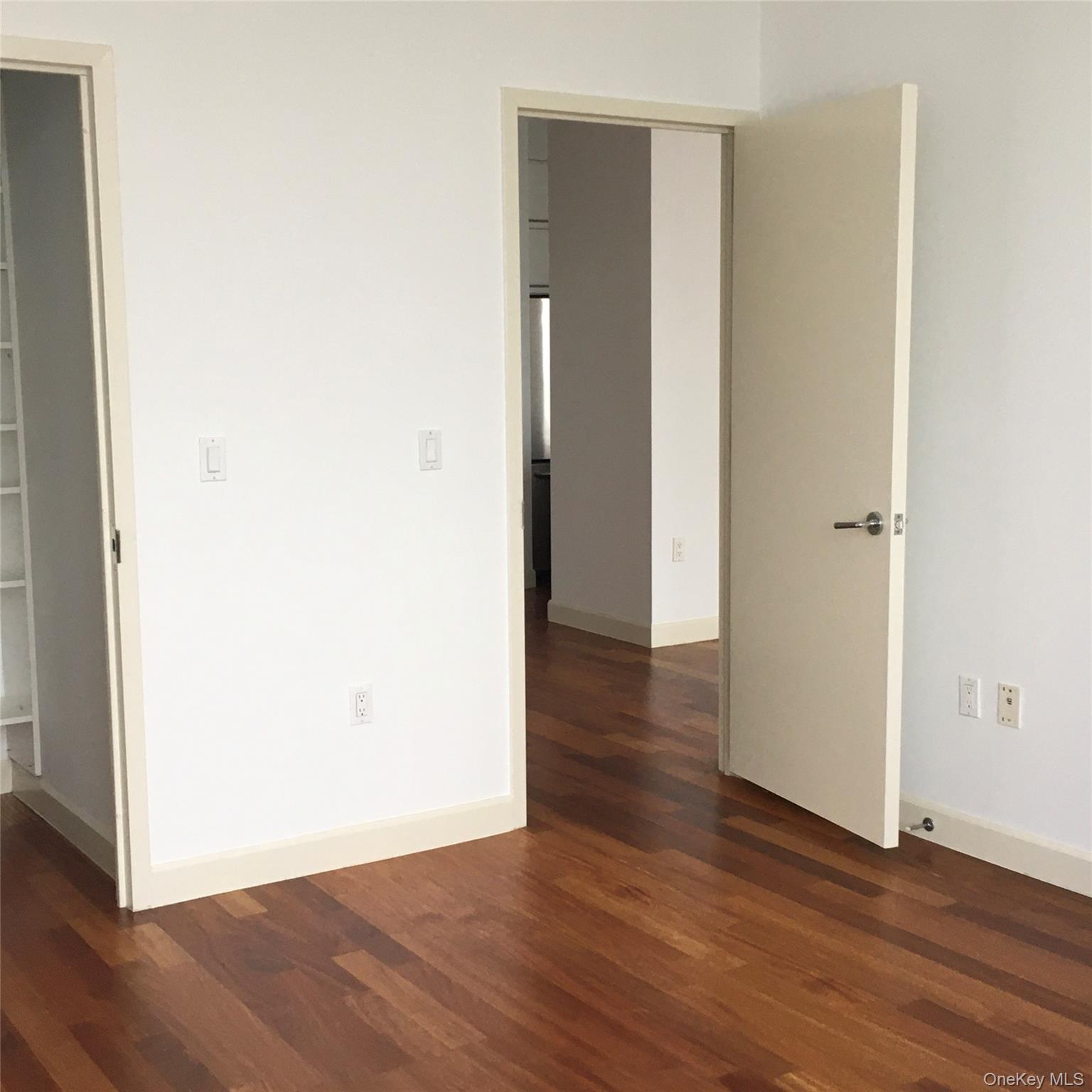 100 Jay Street, Unit 28B Brooklyn, NY 11201 - Photo 30 of 47 a view of a hallway with wooden floor