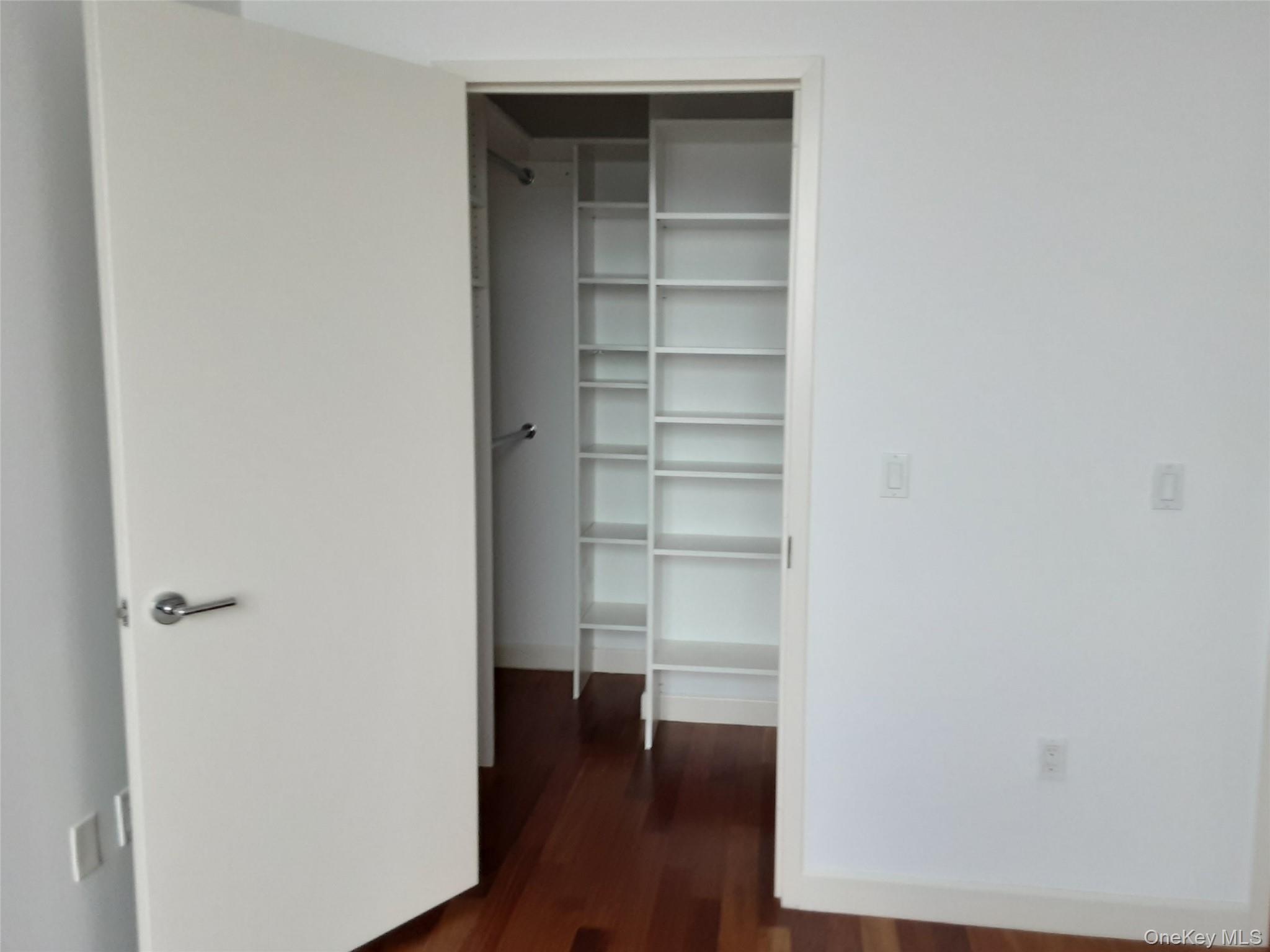 100 Jay Street, Unit 28B Brooklyn, NY 11201 - Photo 33 of 47 a view of a room with wooden floor