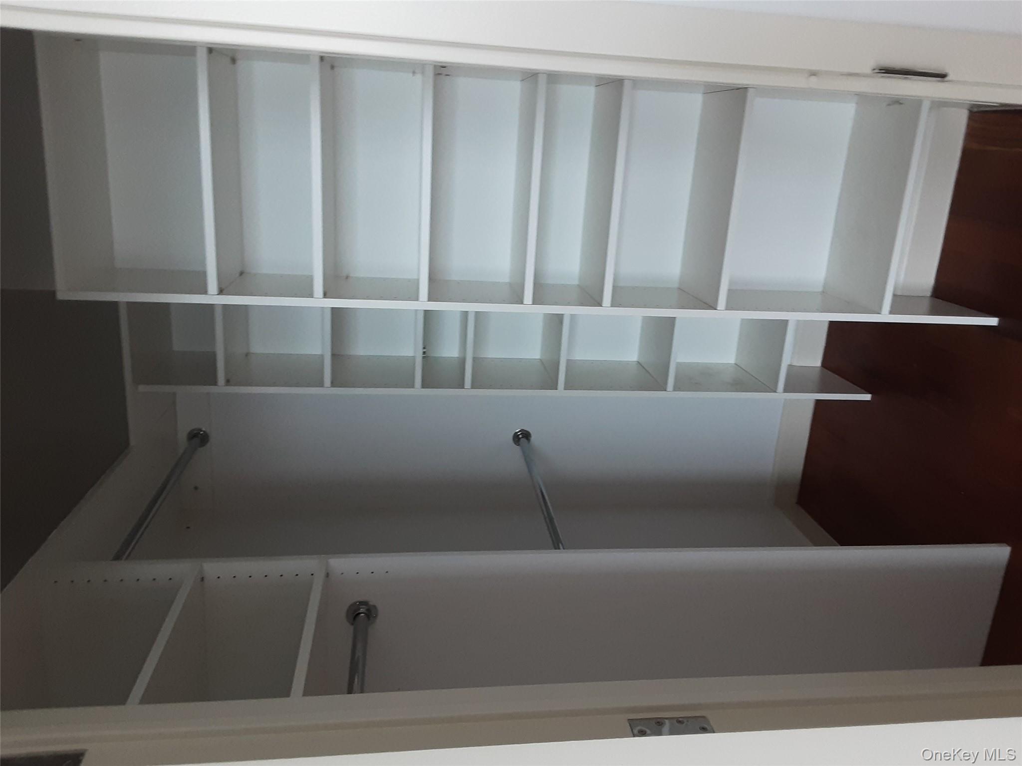 100 Jay Street, Unit 28B Brooklyn, NY 11201 - Photo 34 of 47 a view of walk in closet with empty racks