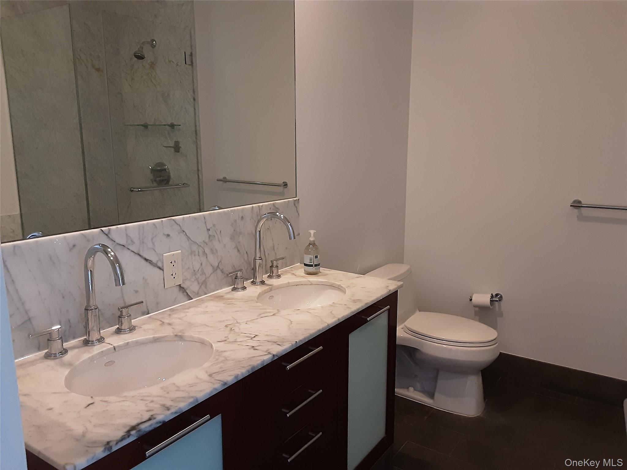 100 Jay Street, Unit 28B Brooklyn, NY 11201 - Photo 36 of 47 a bathroom with a granite countertop sink and a toilet