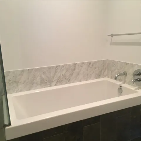 a bathroom with a bathtub