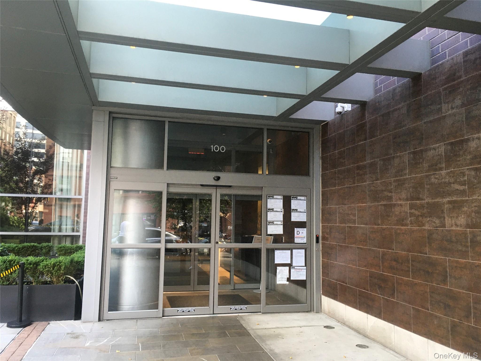 100 Jay Street, Unit 28B Brooklyn, NY 11201 - Photo 5 of 47 a view of a brick house with a large window