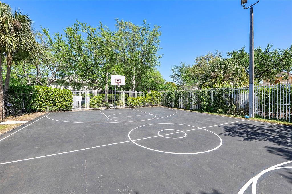 9914 Northwest 56th Place Coral Springs, FL 33076 - Photo 16 of 19 a view of a basketball court