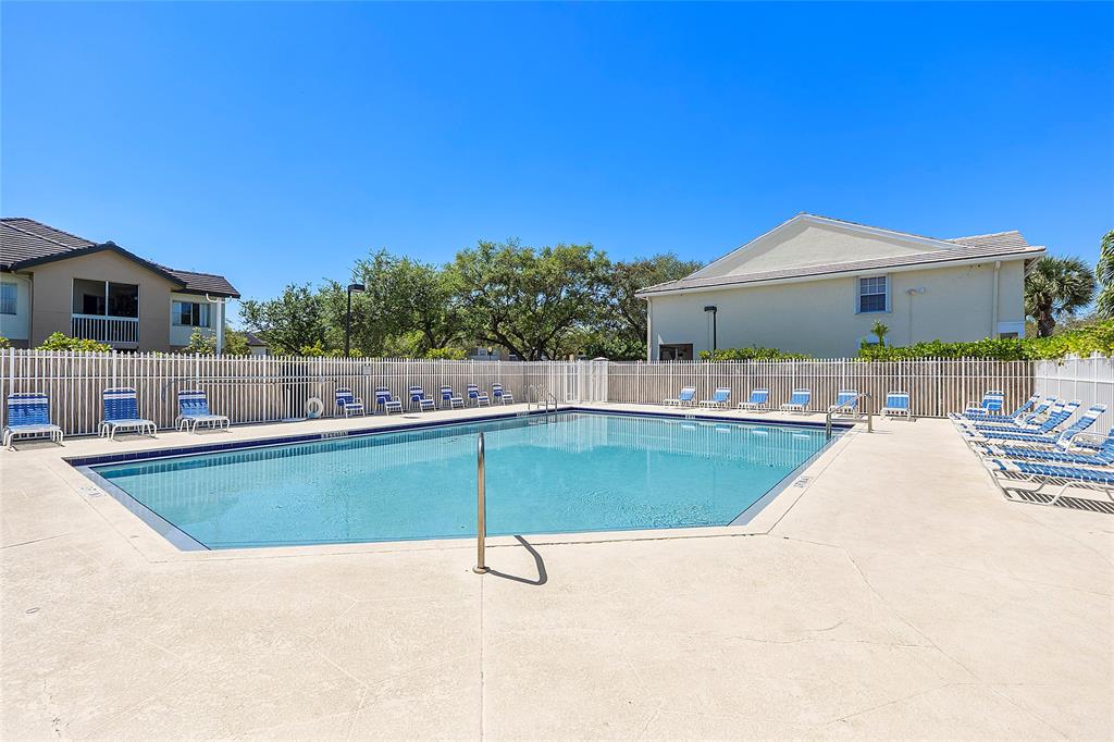 9914 Northwest 56th Place Coral Springs, FL 33076 - Photo 2 of 19 a view of outdoor space and swimming pool