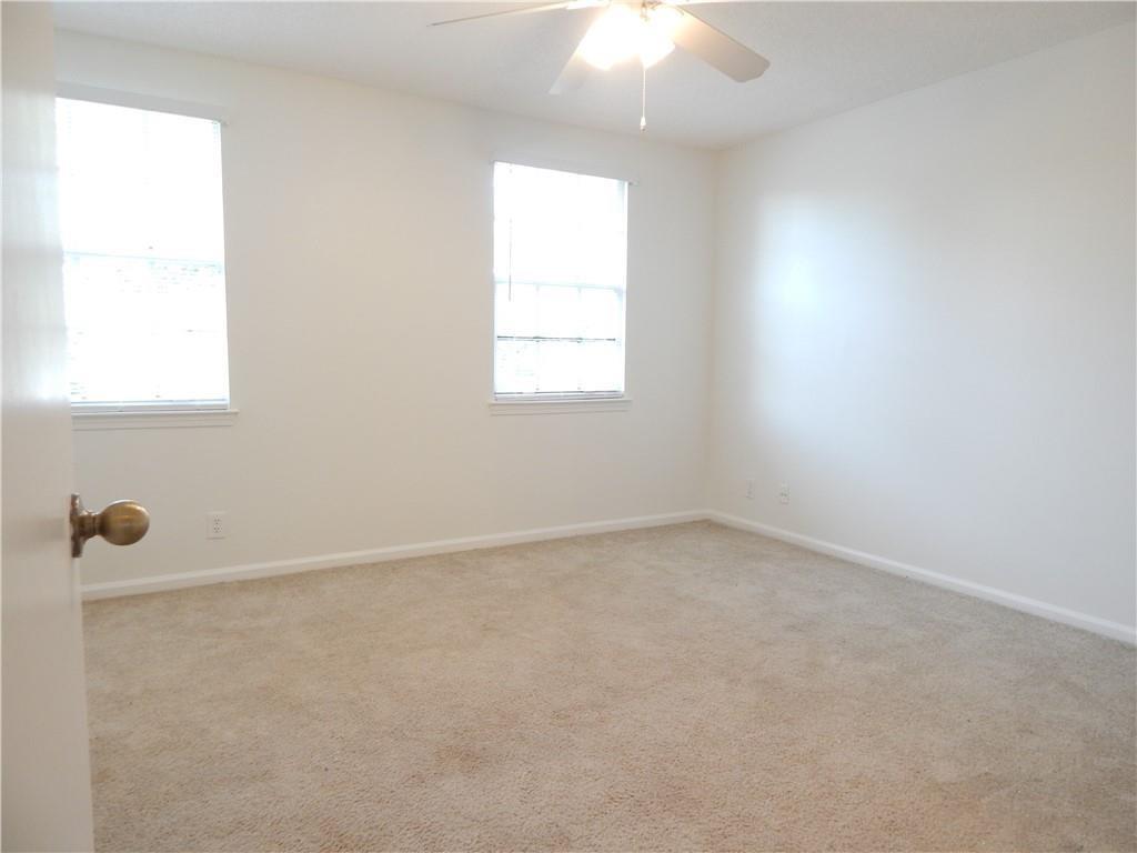 9914 Northwest 56th Place Coral Springs, FL 33076 - Photo 10 of 19 an empty room with a window