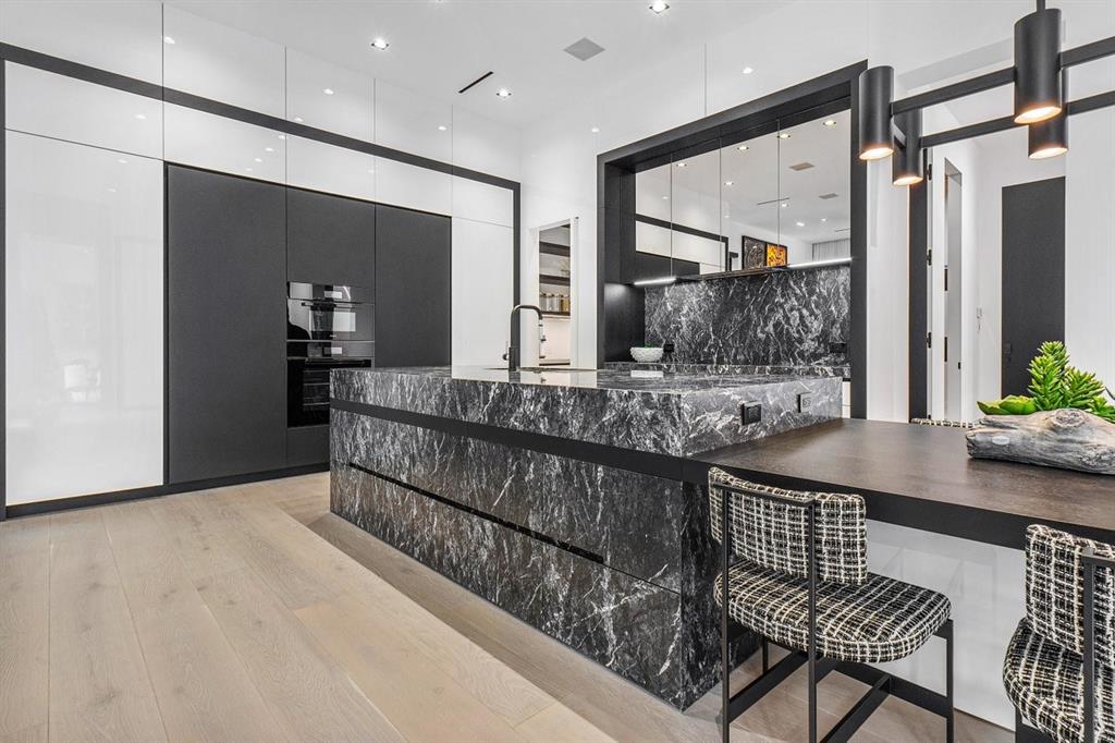 202 Northwest 7th Street Delray Beach, FL 33444 - Photo 16 of 100 a bathroom with a granite countertop sink and a mirror