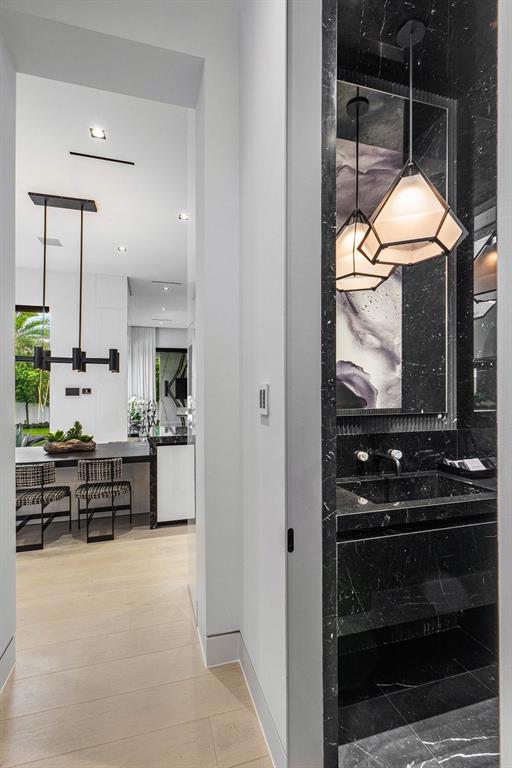 202 Northwest 7th Street Delray Beach, FL 33444 - Photo 26 of 100 a kitchen with stainless steel appliances a stove a microwave and a counter top space