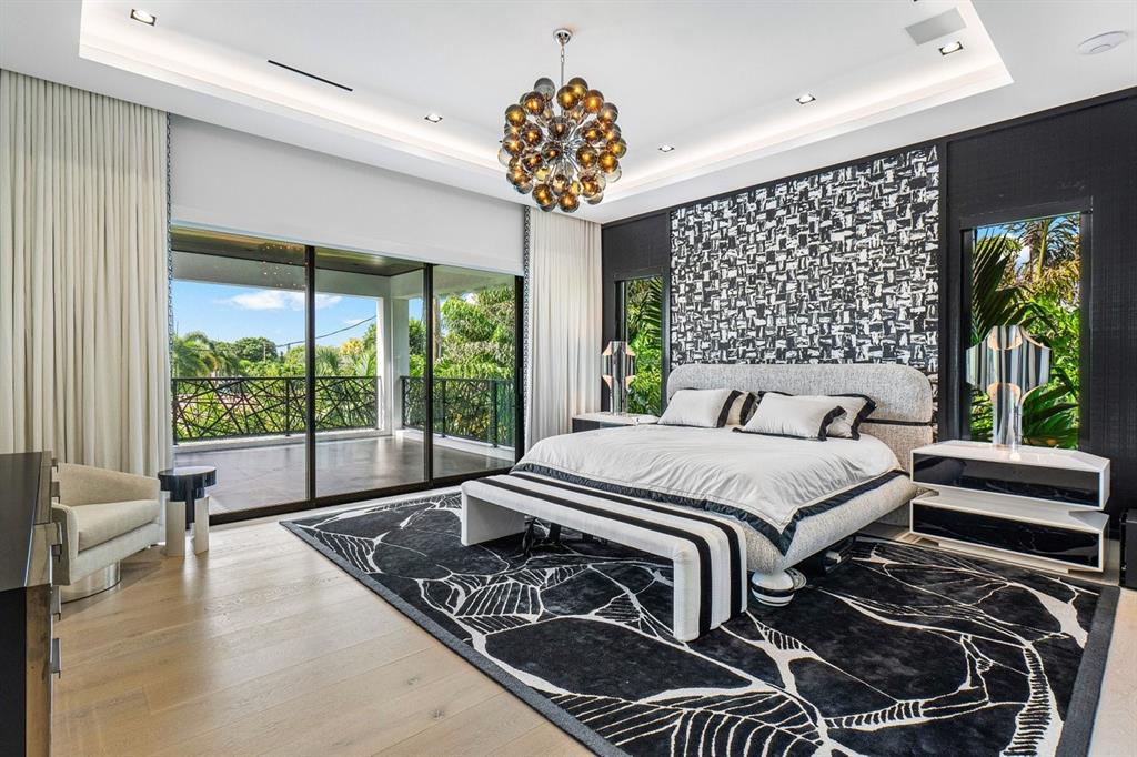 202 Northwest 7th Street Delray Beach, FL 33444 - Photo 42 of 100 a bedroom with a bed and a large window