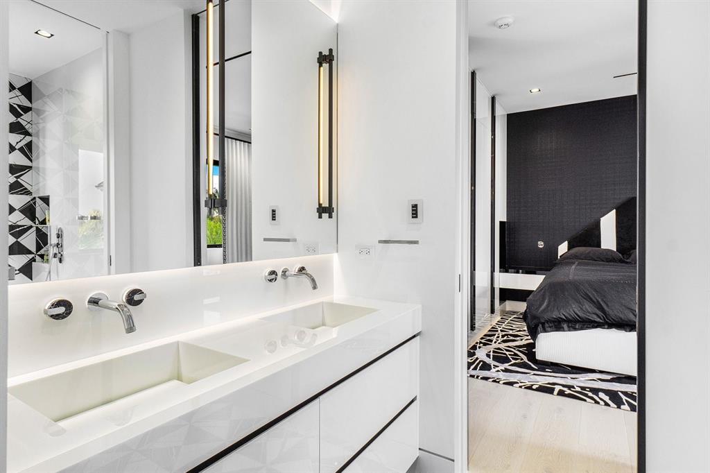 202 Northwest 7th Street Delray Beach, FL 33444 - Photo 50 of 100 a en suite bathroom with a sink and mirror