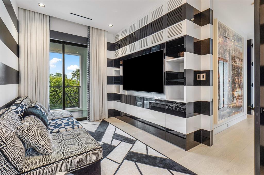 202 Northwest 7th Street Delray Beach, FL 33444 - Photo 54 of 100 a living room with furniture and a flat screen tv