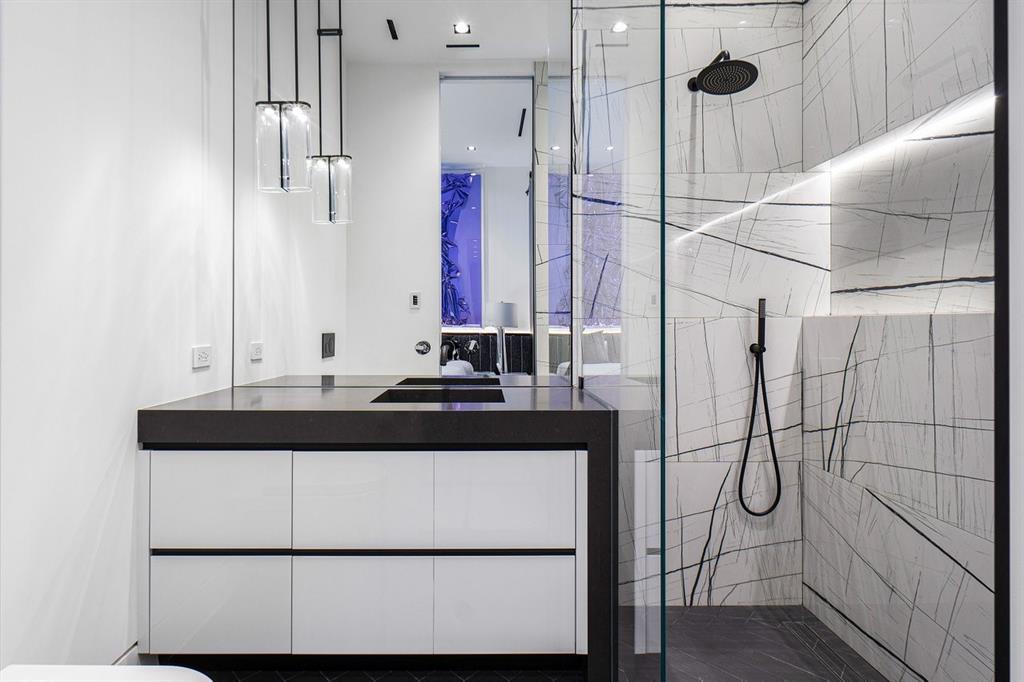 202 Northwest 7th Street Delray Beach, FL 33444 - Photo 59 of 100 a bathroom with a sink and a mirror