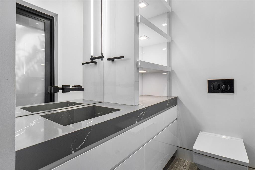 202 Northwest 7th Street Delray Beach, FL 33444 - Photo 62 of 100 a bathroom with a sink and a mirror