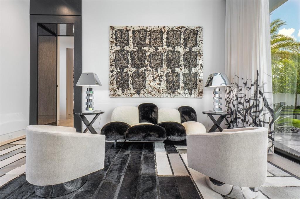 202 Northwest 7th Street Delray Beach, FL 33444 - Photo 7 of 100 a living room with furniture and a potted plant