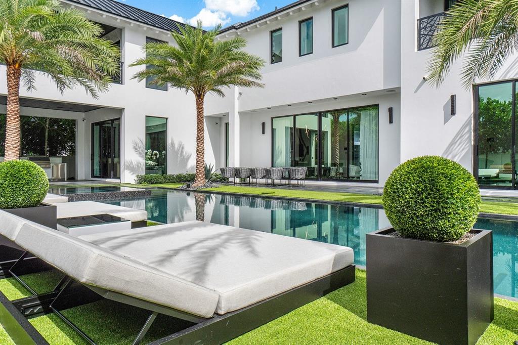 202 Northwest 7th Street Delray Beach, FL 33444 - Photo 77 of 100 a view of house with swimming pool and outdoor seating