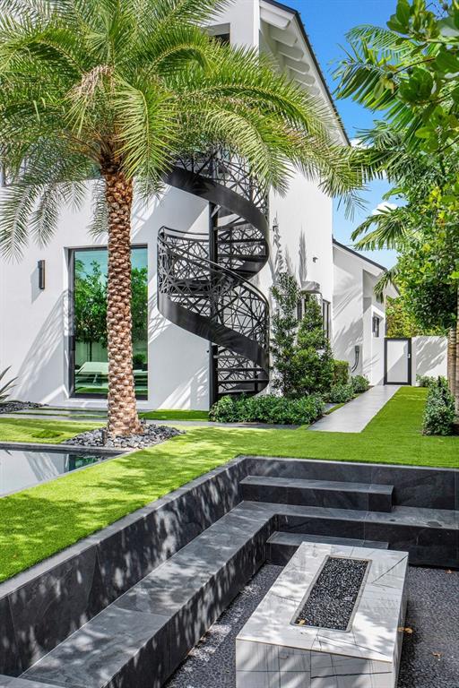 202 Northwest 7th Street Delray Beach, FL 33444 - Photo 79 of 100 a view of a backyard with a garden and plants