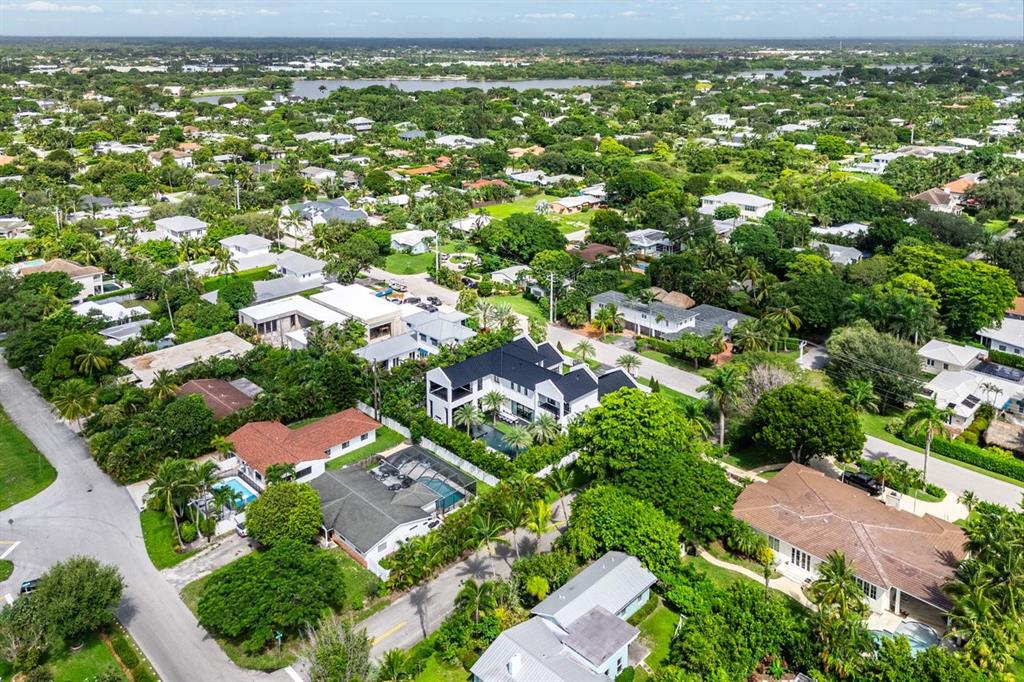 202 Northwest 7th Street Delray Beach, FL 33444 - Photo 91 of 100 an aerial view of residential houses with outdoor space and trees