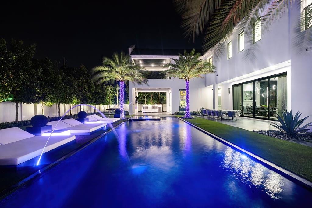 202 Northwest 7th Street Delray Beach, FL 33444 - Photo 97 of 100 a view of a swimming pool with seating space