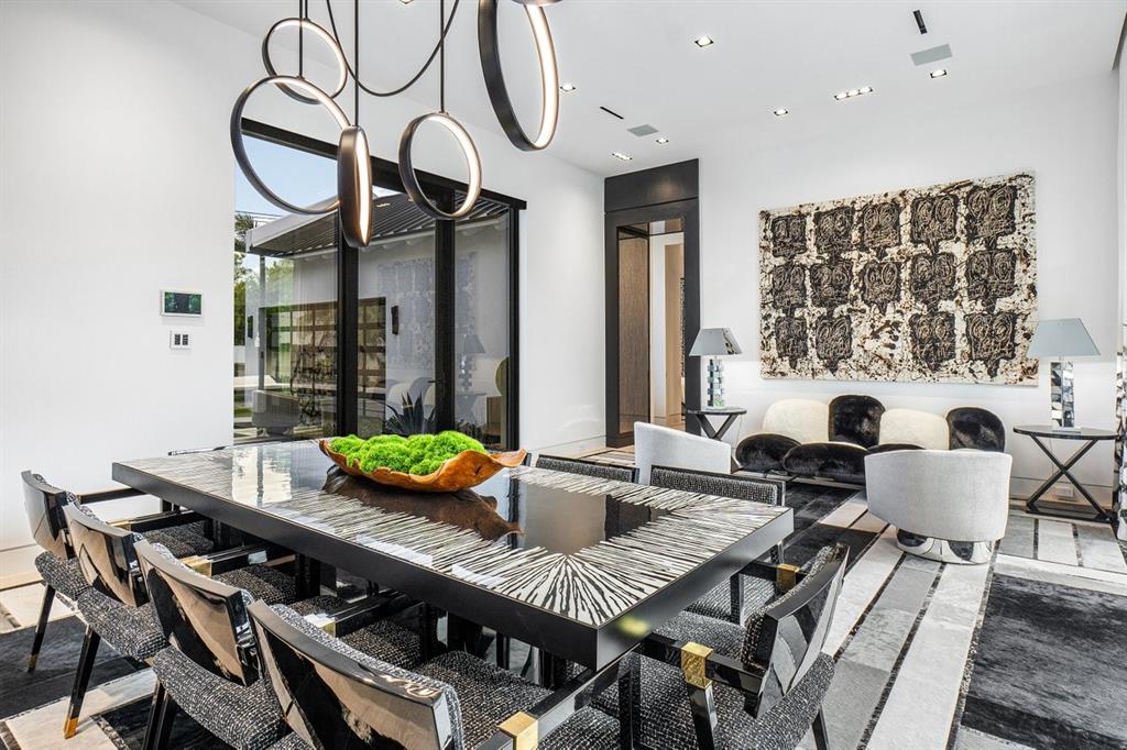 202 Northwest 7th Street Delray Beach, FL 33444 - Photo 10 of 100 a view of a dining room and hall with furniture