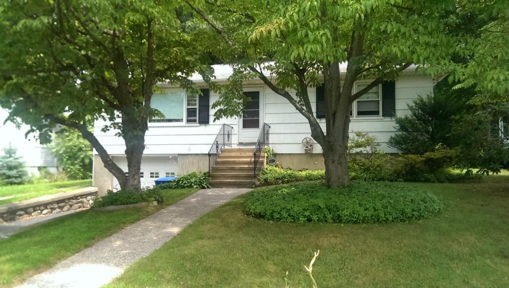 41 Phyllis Avenue Waterbury, CT 06708 - Photo 1 of 1 a front view of a house with garden
