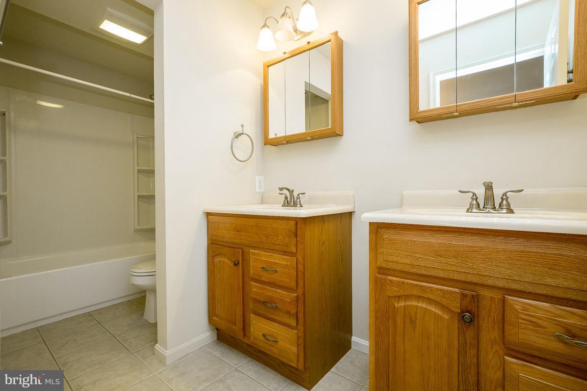 5092 Ebenezer Church Road Midland, VA 22728 - Photo 26 of 30 Bath with dual vanities