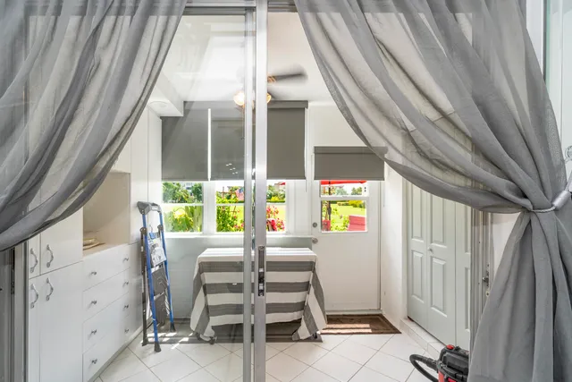 a view of a balcony with chairs