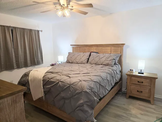 a view of a cafe with sitting area