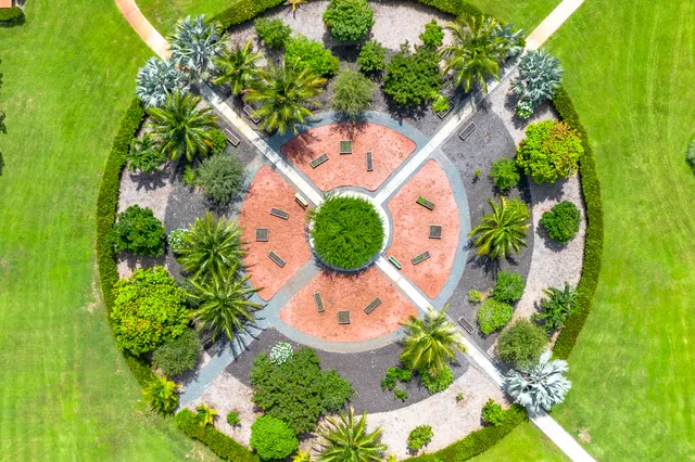 a view of a house with a space and garden