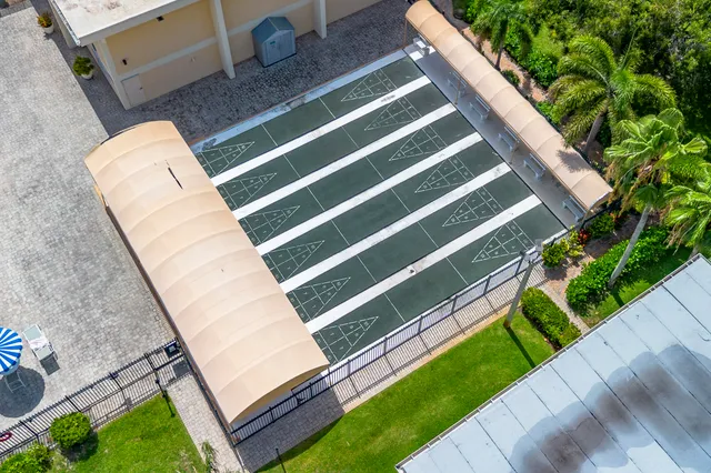 an aerial view of a house with a garden