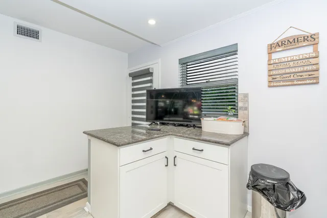 a kitchen with a stove and a microwave