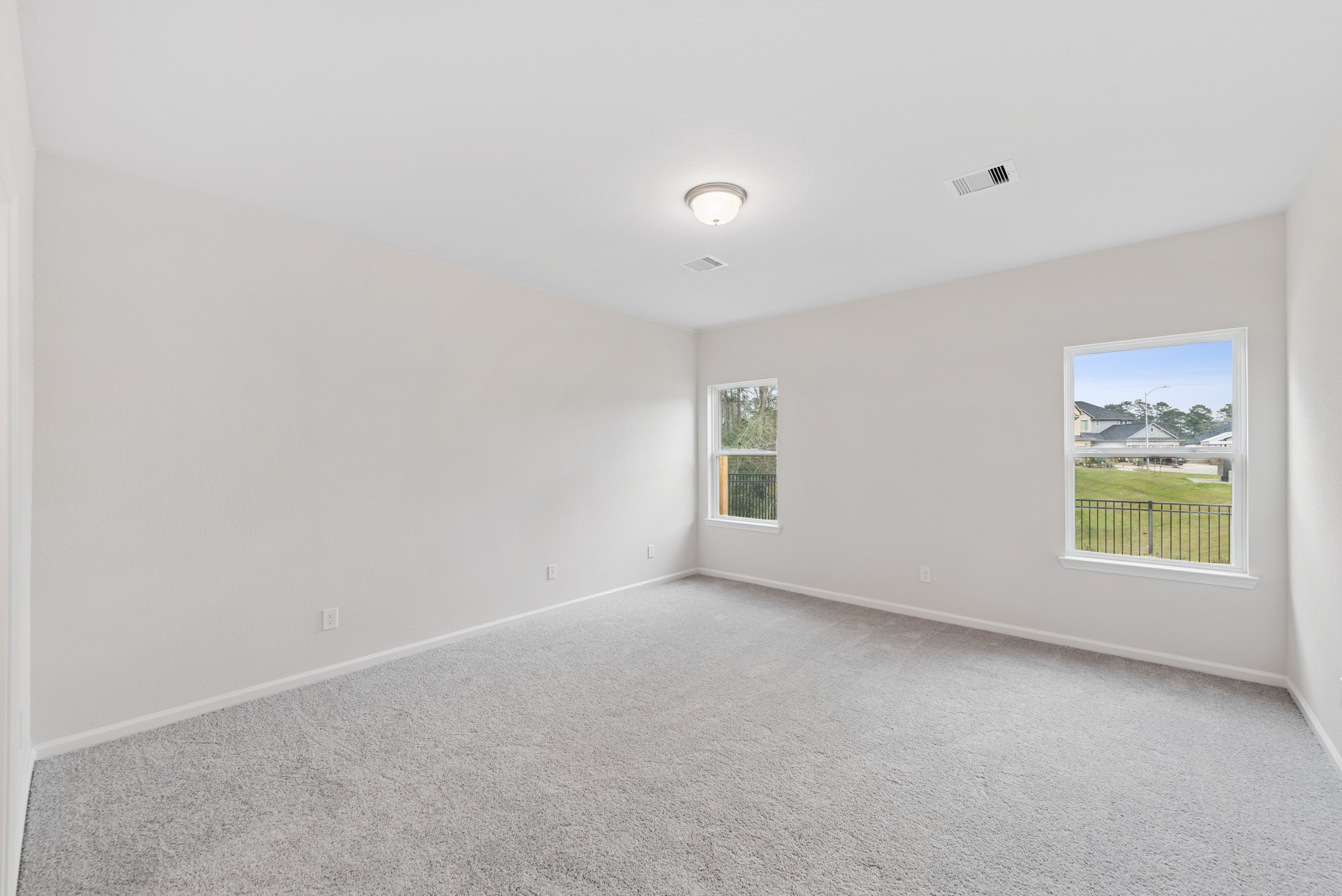 537 Stone Placa Trail Pattison, TX 77423 - Photo 11 of 28 an empty room with windows