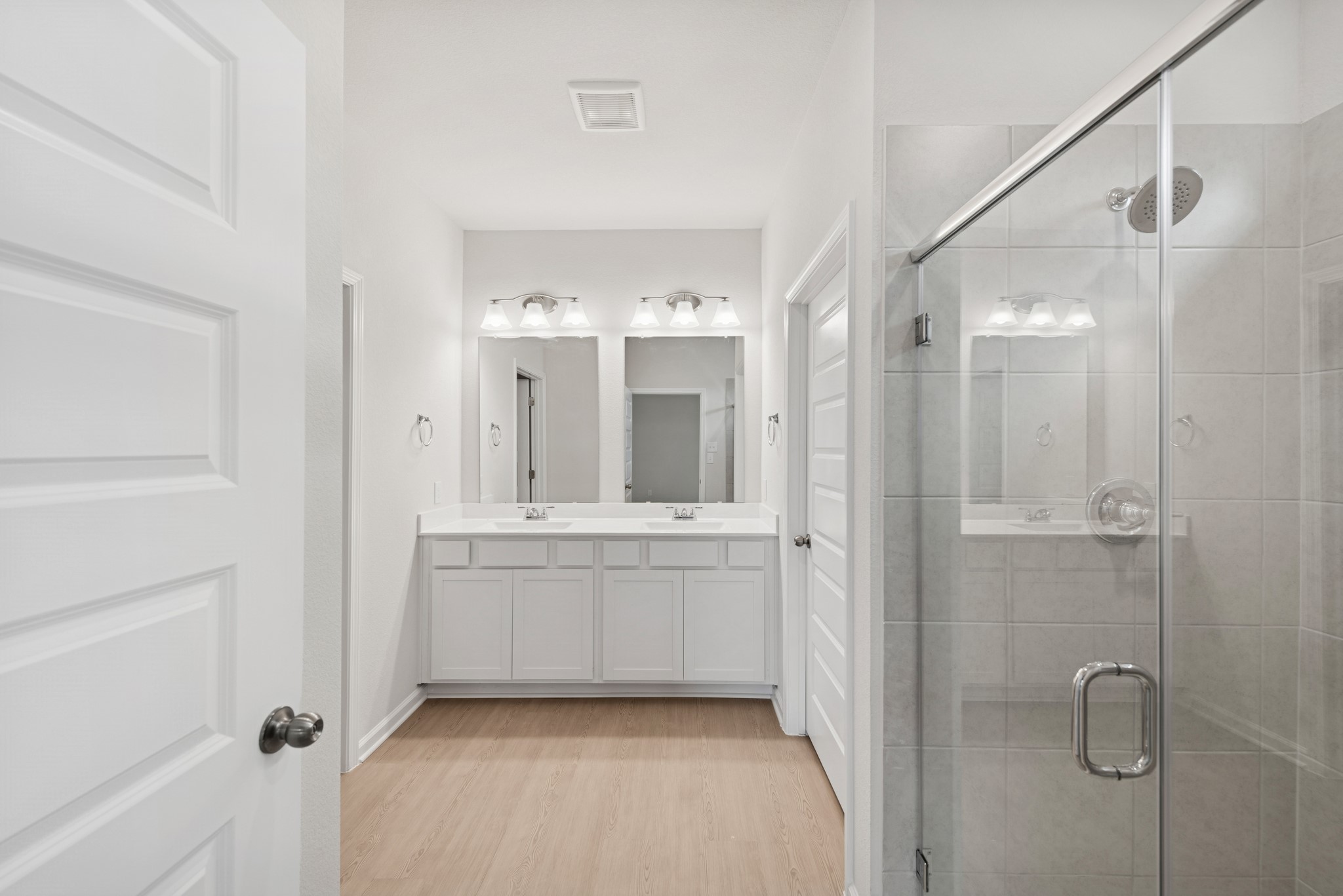 537 Stone Placa Trail Pattison, TX 77423 - Photo 15 of 28 a bathroom with a granite countertop sink a mirror and a shower
