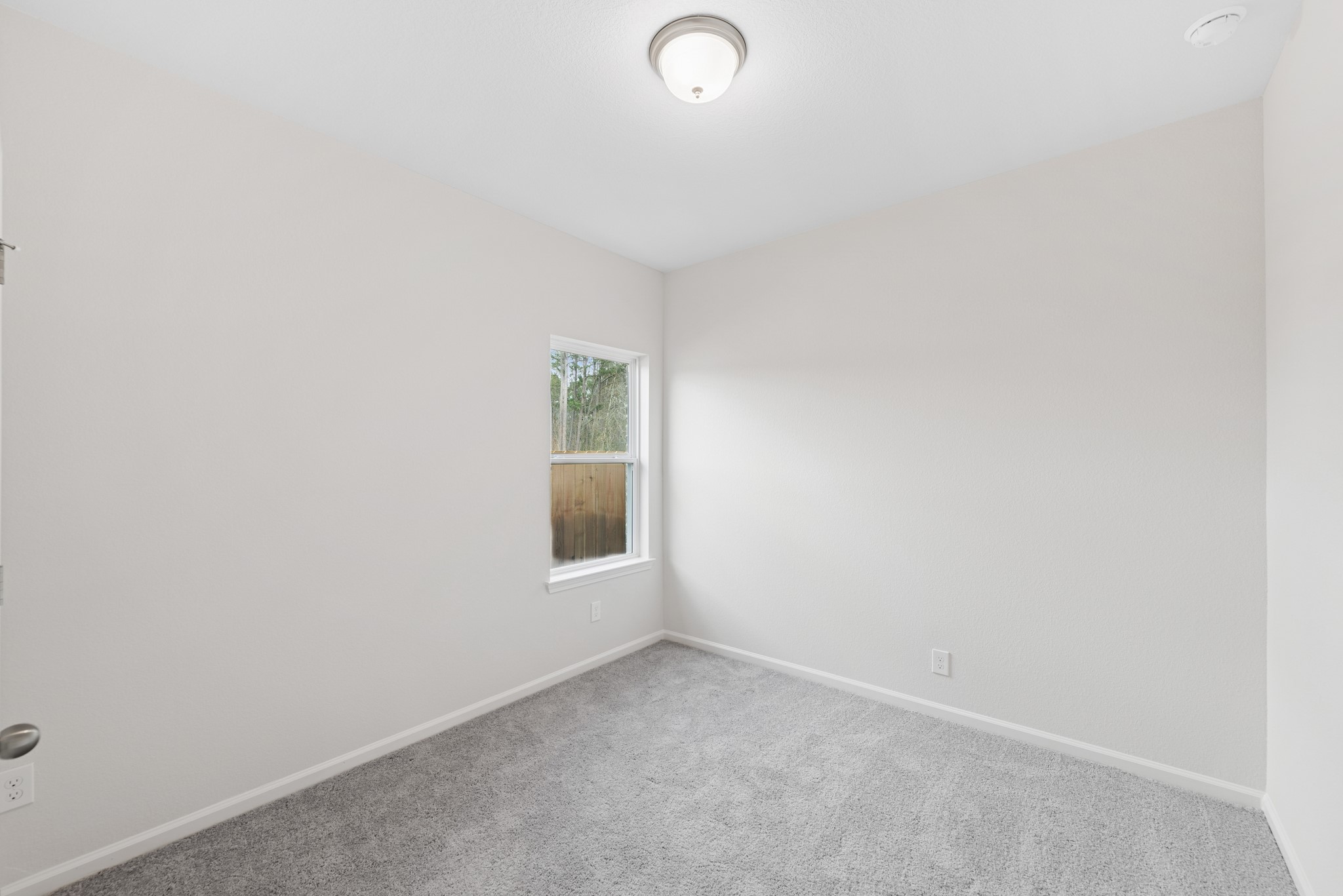 537 Stone Placa Trail Pattison, TX 77423 - Photo 22 of 28 a view of an empty room with a window
