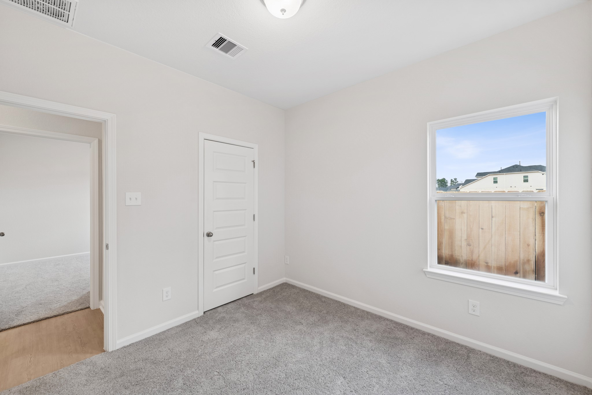 537 Stone Placa Trail Pattison, TX 77423 - Photo 24 of 28 an empty room with windows and closet