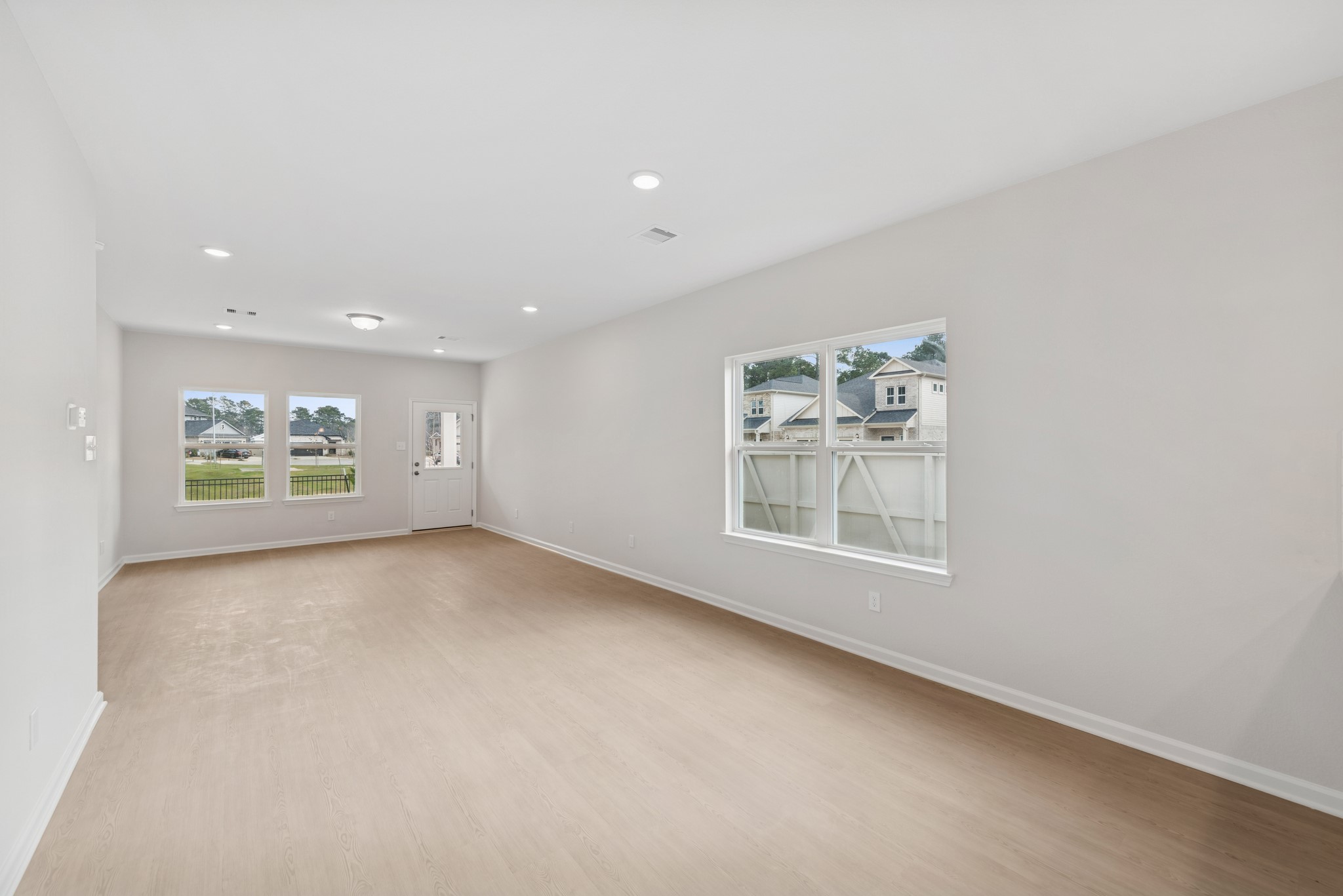 537 Stone Placa Trail Pattison, TX 77423 - Photo 7 of 28 an empty room with windows