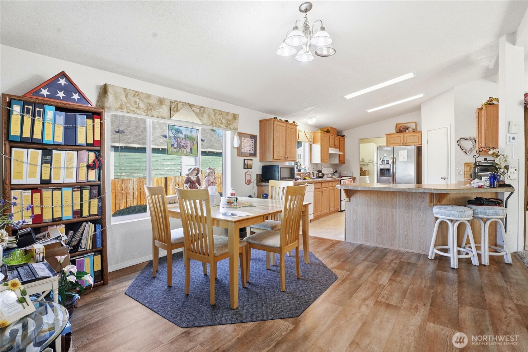 1003 Lord Street Kelso, WA 98626 - Photo 11 of 29 a view of a dining room with furniture window and wooden floor