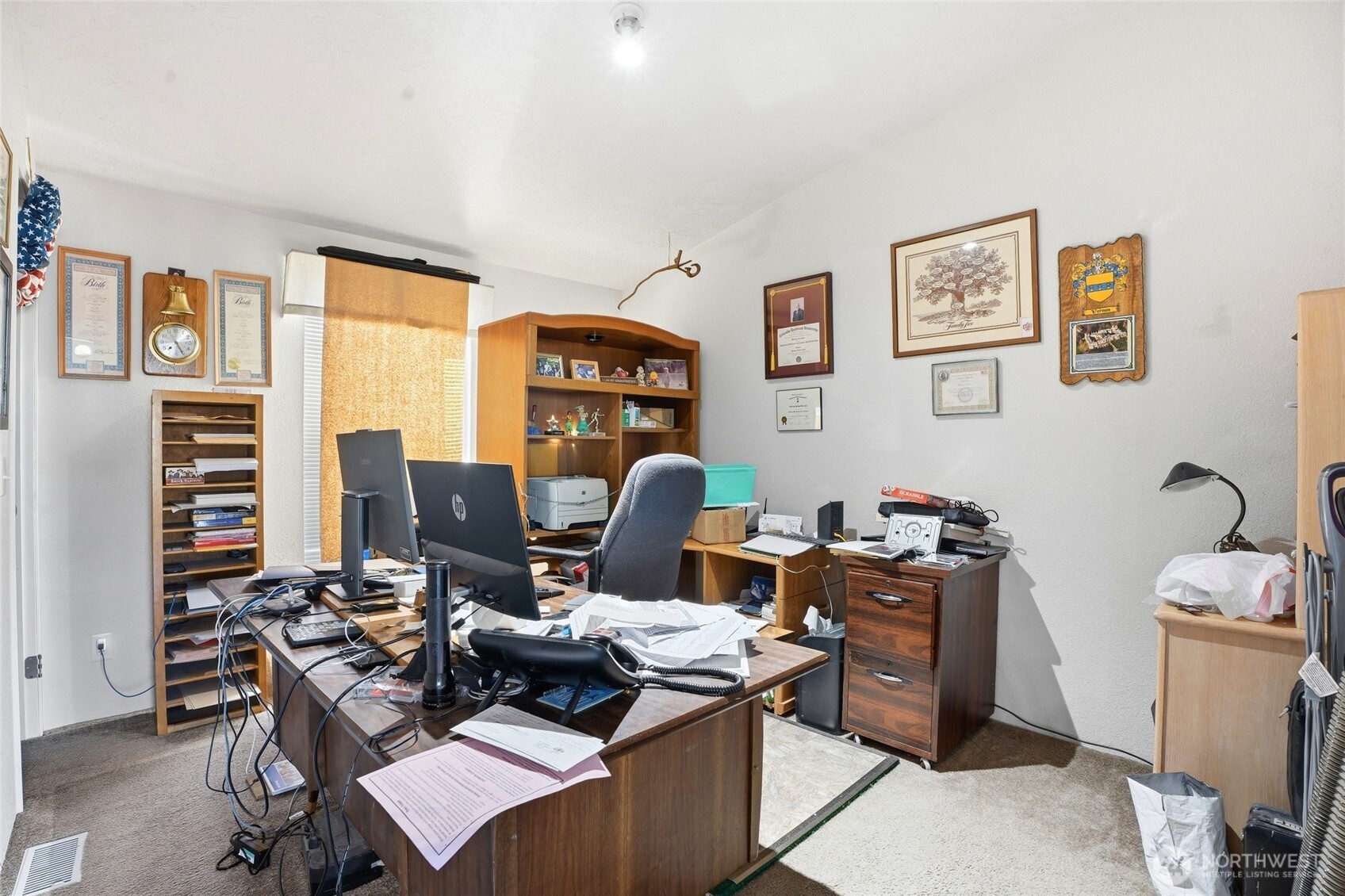 1003 Lord Street Kelso, WA 98626 - Photo 6 of 29 a view of a workspace with furniture and a window